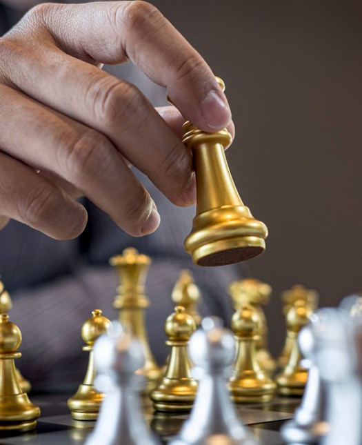 gold-and-silver-chess-with-player-intelligent-businessman-playing-chess-game-competition-to-planning_t20_Nx06Rl.jpg